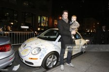 gettyimages-Fashion Designer Marcus Wainwright and son Noah.jpg
